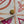 FÉLICIE POCHETTE 21 IN CORAL MONOGRAM TILES CANVAS