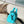 KEEPALL BANDOULIÈRE 25 IN TURQUOISE BLUE MONOGRAM EMBOSSED CALFSKIN