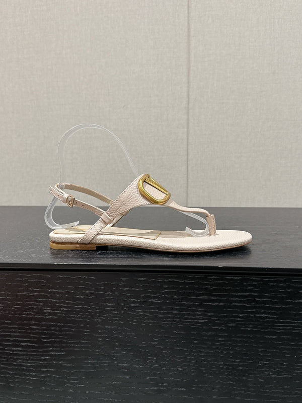 SANDALO INFRADITO IN VITELLO BEIGE CON LOGO ORO