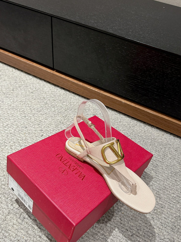 SANDALO INFRADITO IN VITELLO BEIGE CON LOGO ORO