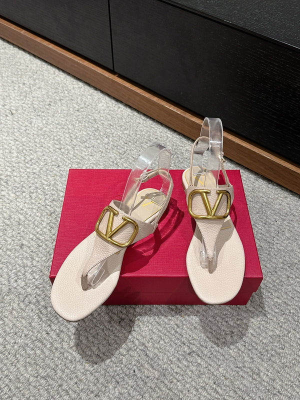 SANDALO INFRADITO IN VITELLO BEIGE CON LOGO ORO