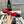 slingback piatte in tweed rosso e pelle di vitello verniciata nera