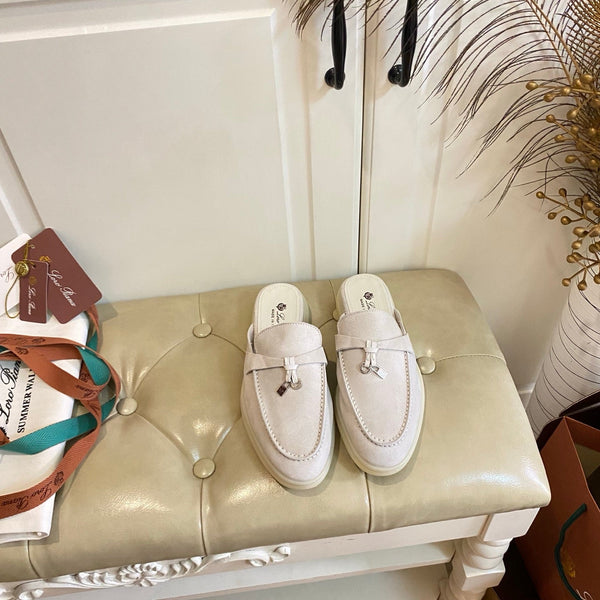 LP 26s Lock Charm Mules In Cream White Suede