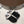 Miumiu 25 Pantoufles garnies de shearling en daim noir et laine 547578