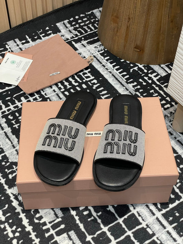 Miu 25S Beige and Black Canvas and leather slides 227133