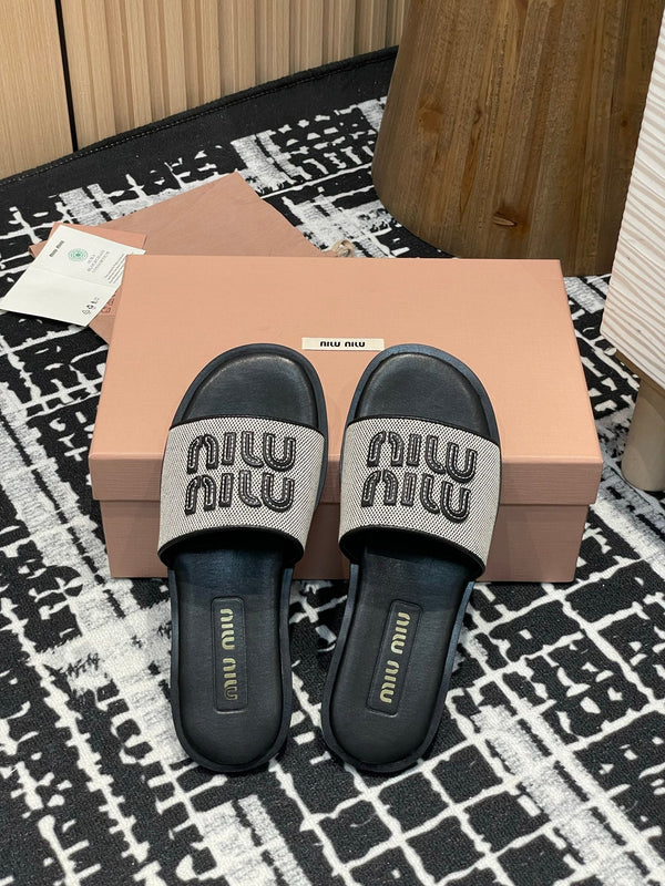 Miu 25S Beige and Black Canvas and leather slides 227133