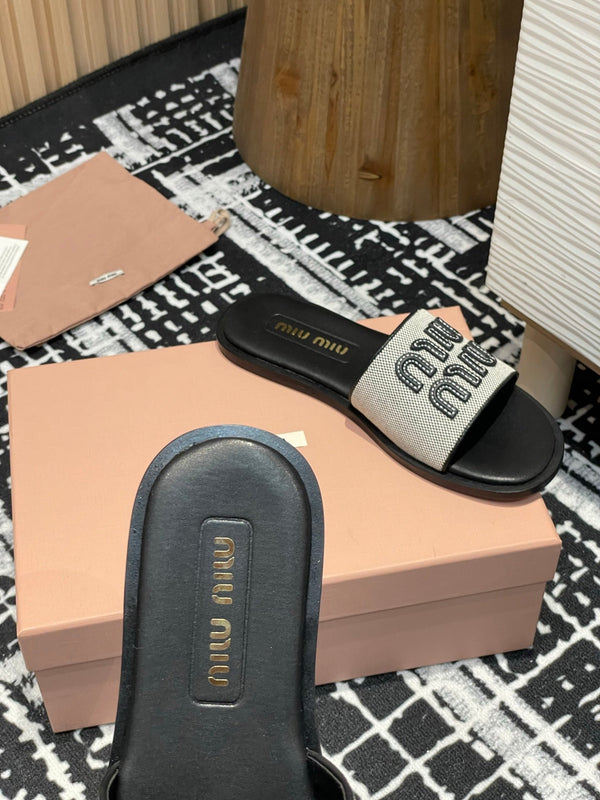 Miu 25S Beige and Black Canvas and leather slides 227133