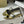 Sandali con tacco alto e cinturino The Row 25S, 35 mm, in pelle di vacchetta metallizzata nera e oro 286218
