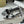 Sandali con tacco alto e cinturino The Row 25S, 35 mm, in pelle di vacchetta metallizzata nera e argento 286217