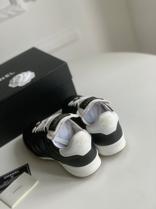 Sneaker CC in pelle di agnello nera trapuntata 143552