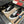 Sneaker GG ACE da uomo in pelle di vacchetta goffrata nera 543296