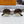 SIGNATURE ROUND SUNGLASS 581382 IN GOLD METAL BROWN SMOKE LENSES