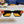 RECTANGLE SUNGLASSES 575848 IN BLACK ACETATE ORANGE METAL YELLOW LENS