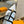 HIGH PUMP 5 CM TRIPLE-STRAP IN WHITE CALFSKIN WITH BLACK STRAP