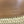 le 37 woven raffia 20cm brown calfskin