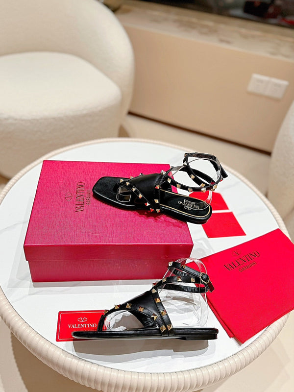 VT Flat-soled Rivet-back Hollow Sandals Black Cowhide