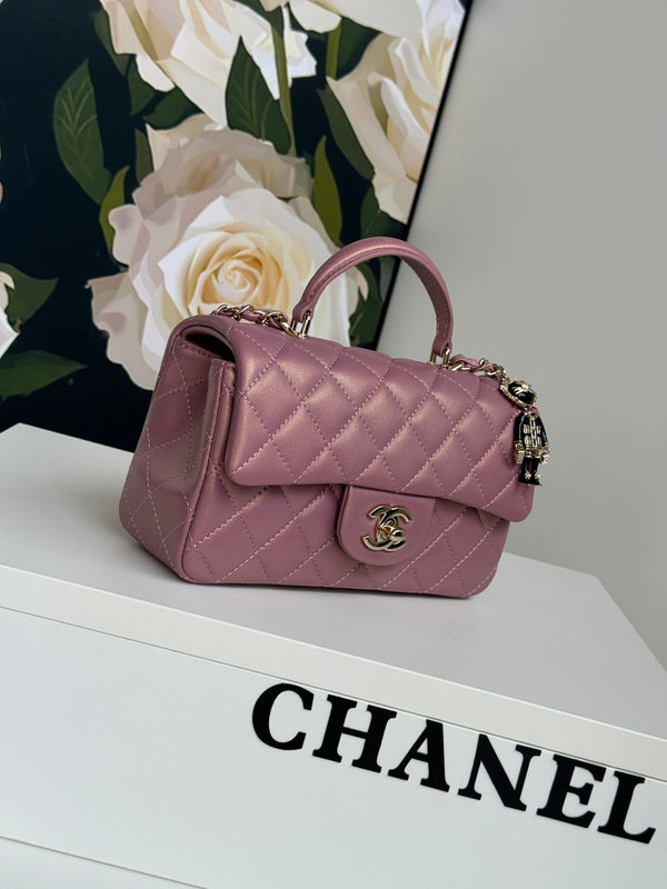 Borsa mini con patta 24c 20 cm con manico superiore in pelle di vitello rosa viola