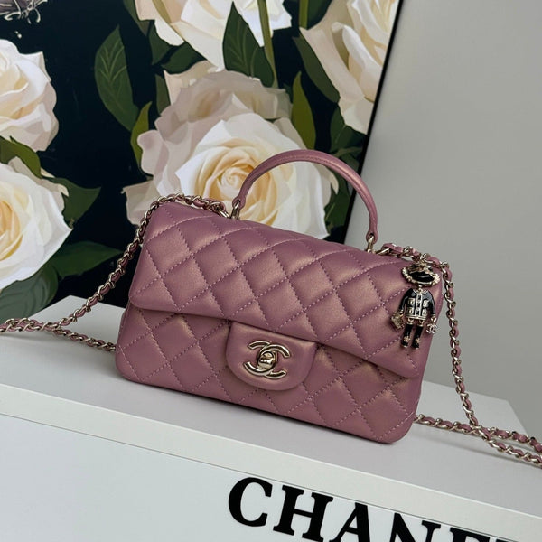 Borsa mini con patta 24c 20 cm con manico superiore in pelle di vitello rosa viola