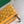 MATIGNON MINI WALLET 11 IN YELLOW GOYARDINE CANVAS AND CALFSKIN