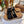 SANDALI CON ZEPPA CHLOÉ WOODY IN TELA NERA CON SUOLA IN GOMMA MARRONE SIDRO