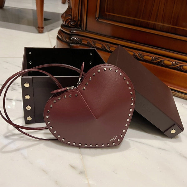 LE COEUR BAG 21 IN BURGUNDY RED CALFSKIN WITH STUDDED HEART