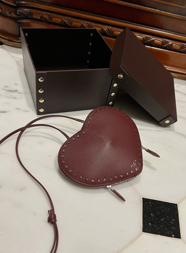 LE COEUR BAG 21 IN BURGUNDY RED CALFSKIN WITH STUDDED HEART