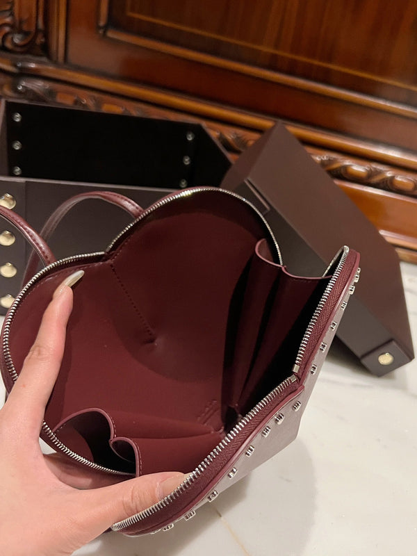 LE COEUR BAG 21 IN BURGUNDY RED CALFSKIN WITH STUDDED HEART