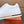 LV TRAINER IN EMBOSSED WHITE SUEDE