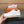 LV TRAINER IN EMBOSSED WHITE SUEDE