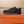 LV TRAINER IN EMBOSSED BLACK SUEDE