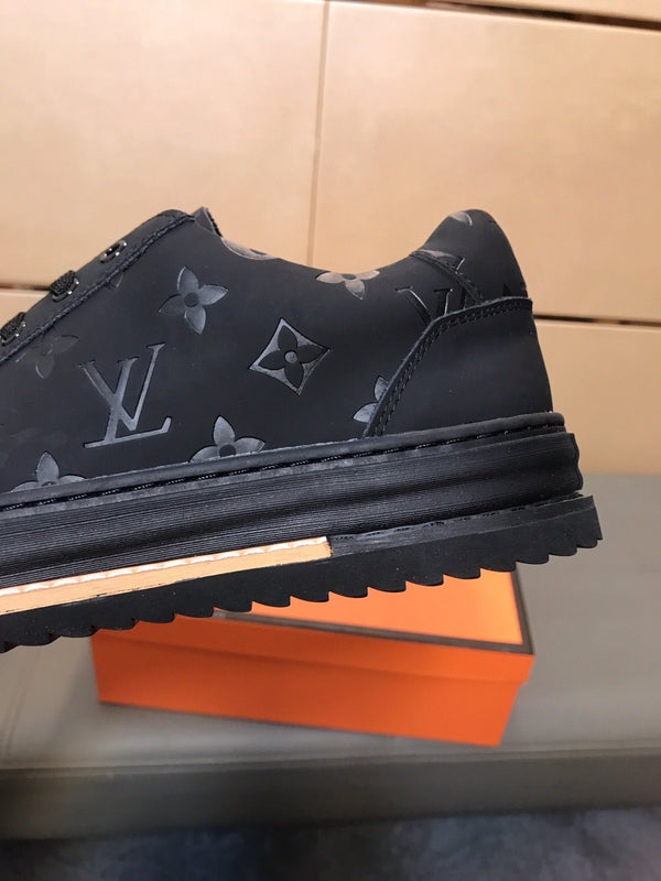 LV TRAINER IN EMBOSSED BLACK SUEDE