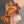 MICRO BAG KEYCHAIN 11 IN HOT CINNAMON ORANGE CALFSKIN EMBOSSED LOGO