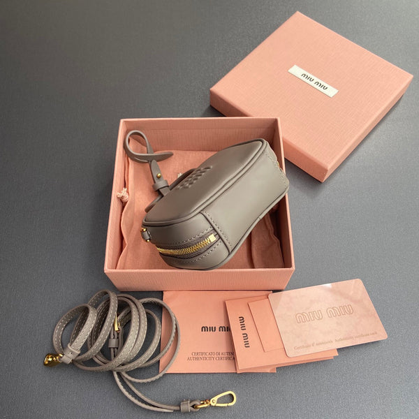 MICRO BAG KEYCHAIN 11 IN CLAY GREY CALFSKIN GOLD HARDWARE EMBOSSED LOGO