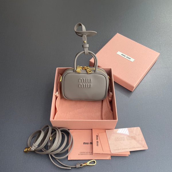 MICRO BAG KEYCHAIN 11 IN CLAY GREY CALFSKIN GOLD HARDWARE EMBOSSED LOGO