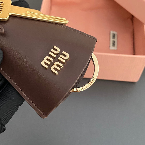 Leather Bag Charm With Key Chocolate Calfskin 240337