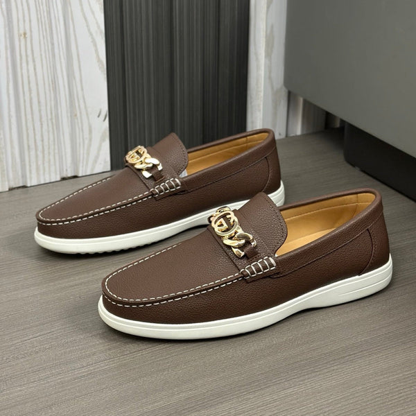 Mocassino GG da uomo con motivo G intrecciato in pelle di vacchetta marrone 573502