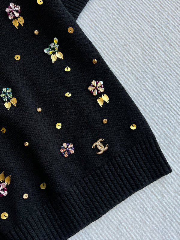 CC 25SS Maglia a maniche corte con fiori in lana nera 229493