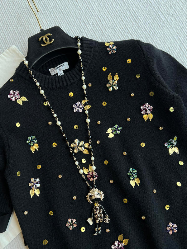 CC 25SS Maglia a maniche corte con fiori in lana nera 229493
