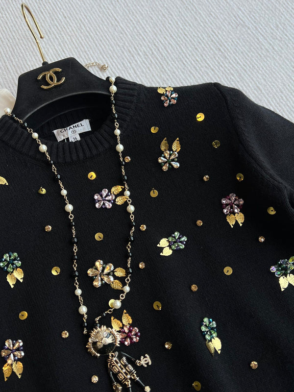 CC 25SS Maglia a maniche corte con fiori in lana nera 229493