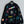 Chanel 25 Sweatshirt ras du cou graffiti en coton noir 312091
