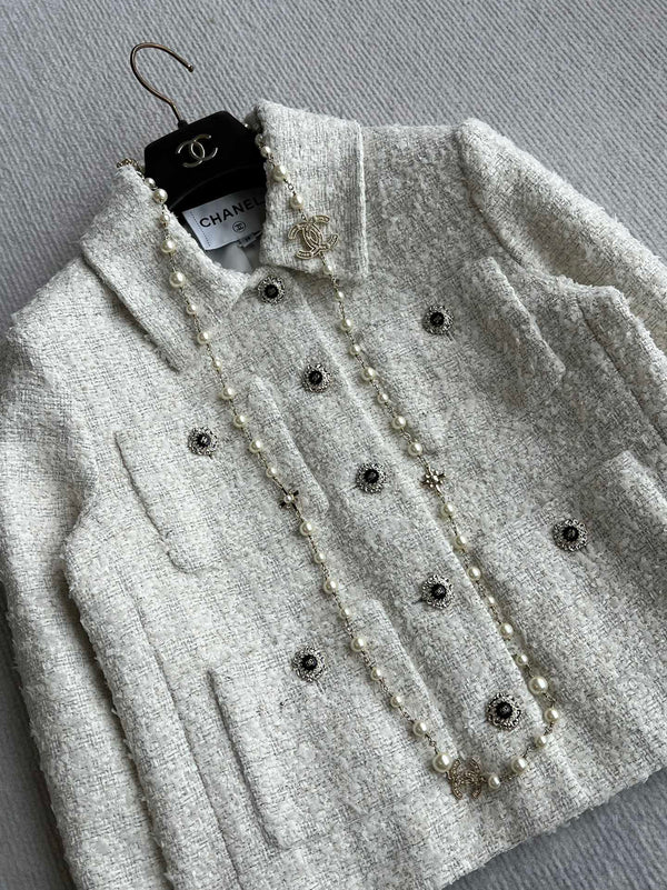 Veste en tissu tweed tissé blanc Chanel 2025 318544