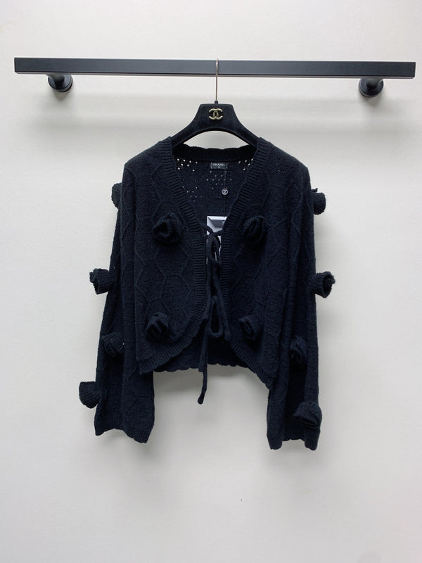 CC 25 Cardigan lavorato a maglia con motivo floreale tridimensionale in nero 277589