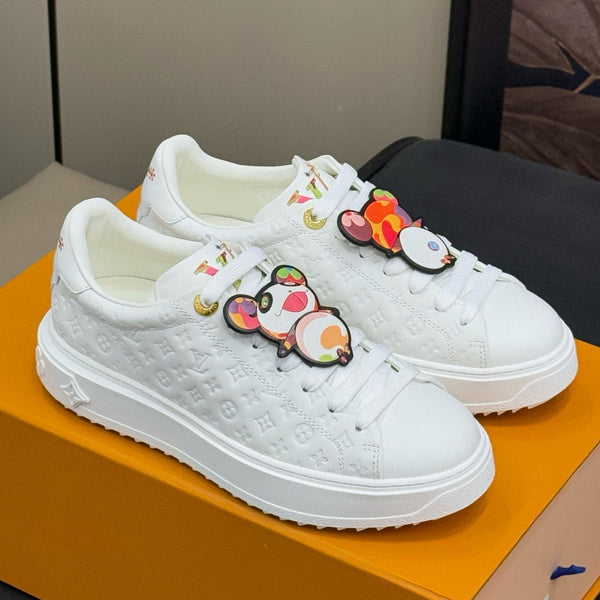 SNEAKER TIME OUT IN PELLE DI VITELLO BIANCA CON MONOGRAMMA IN RILIEVO