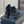 SHORT BOOTS IN BLACK GRAIN PEBBLE CALFSKIN