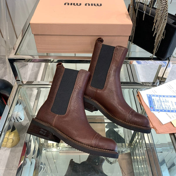 Stivali Miu in pelle di vacchetta mista vegetale color marrone terra