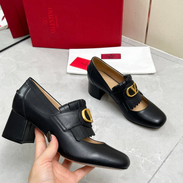 Mocassino con tacco VT 25 Signature in pelle di vitello nera 293943