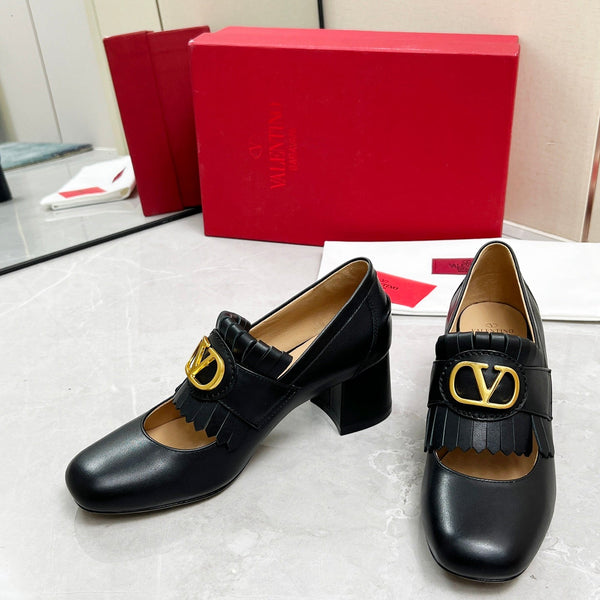 Mocassino con tacco VT 25 Signature in pelle di vitello nera 293943