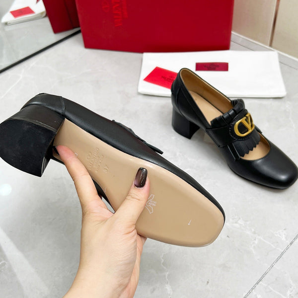 Mocassino con tacco VT 25 Signature in pelle di vitello nera 293943