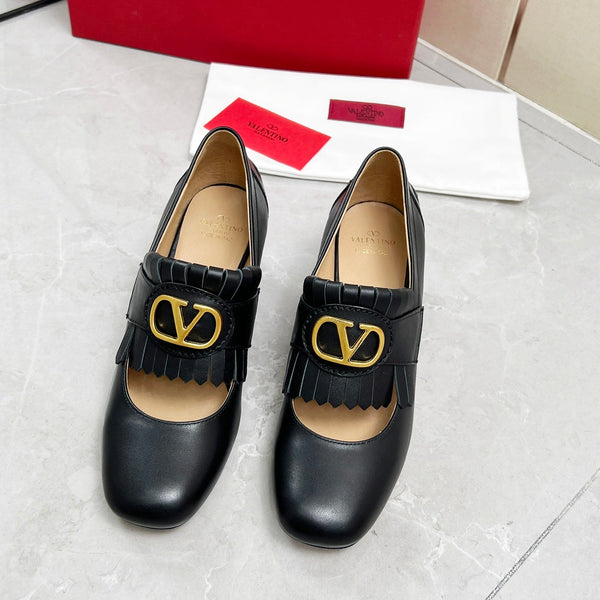 Mocassino con tacco VT 25 Signature in pelle di vitello nera 293943