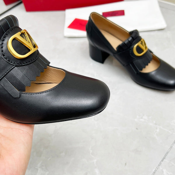 Mocassino con tacco VT 25 Signature in pelle di vitello nera 293943